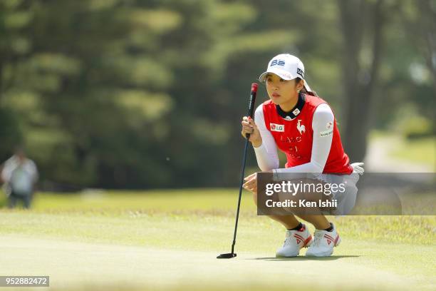 Bo-Mee Lee of Korea prepares to putt on the 15th hole during the final round of the CyberAgent Ladies Golf Tournament at Grand fields Country Club on...