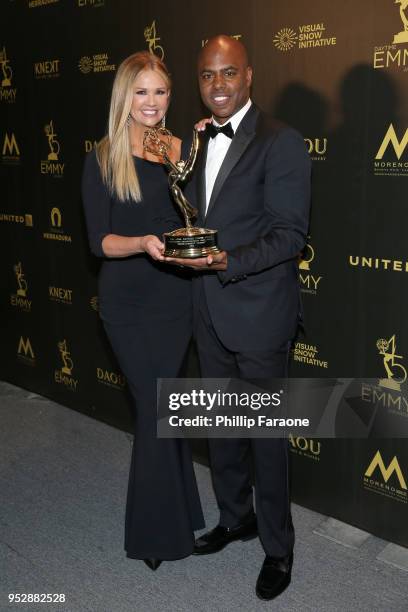 Nancy O'Dell and Kevin Frazier, winners of Outstanding Entertainment News Program for 'Entertainment Tonight', pose in the press room during the 45th...