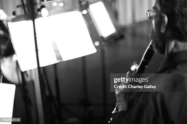 Musician Brian Collins of the Mont Alton Motion Picure Orchestra plays the clarinet at the screening of 'The Phantom of the Opera' during day 4 of...