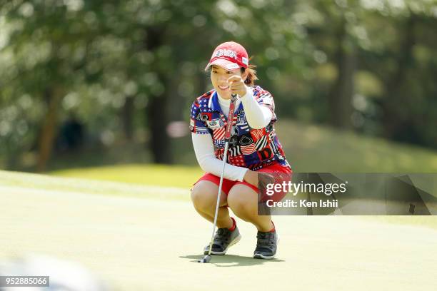 Ritsuko Ryu of Japan prepares to putt on the 15th green during the final round of the CyberAgent Ladies Golf Tournament at Grand fields Country Club...