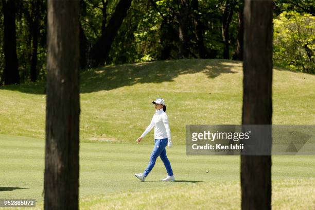 Asuka Kashiwabara of Japan walks down the 14th fair way during the final round of the CyberAgent Ladies Golf Tournament at Grand fields Country Club...