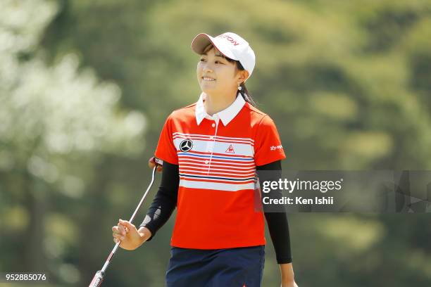 Momoka Miura of Japan reacts after her putt on the 15th green during the final round of the CyberAgent Ladies Golf Tournament at Grand fields Country...