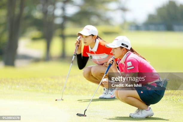 Hikaru Yoshimoto of Japan prepares to her putt on the 15th green during the final round of the CyberAgent Ladies Golf Tournament at Grand fields...