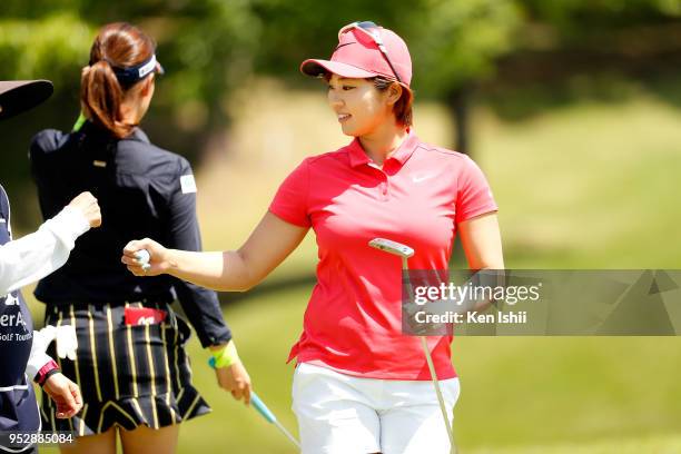 Rumi Yoshiba of Japan reacts after her putt on the 5th hole during the final round of the CyberAgent Ladies Golf Tournament at Grand fields Country...