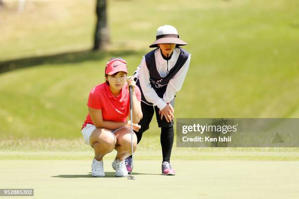 Rumi Yoshiba of Japan prepares to putt on the 5th hole during the final round of the CyberAgent Ladies Golf Tournament at Grand fields Country Club...