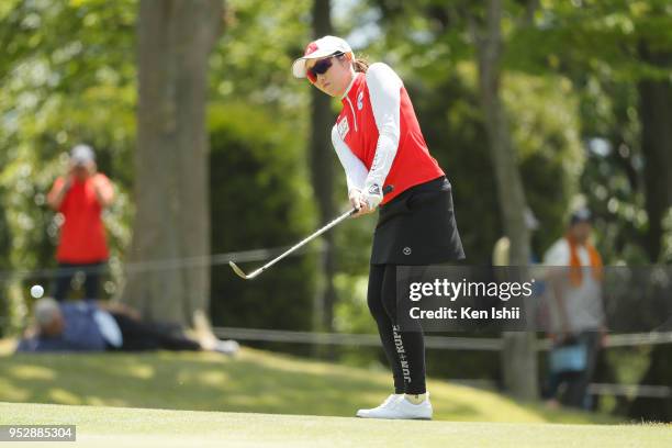 Akane Iijima of Japan putts on the 15th green during the final round of the CyberAgent Ladies Golf Tournament at Grand fields Country Club on April...