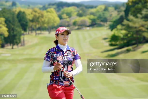 Ritsuko Ryu of Japan walks off the 5th green during the final round of the CyberAgent Ladies Golf Tournament at Grand fields Country Club on April...