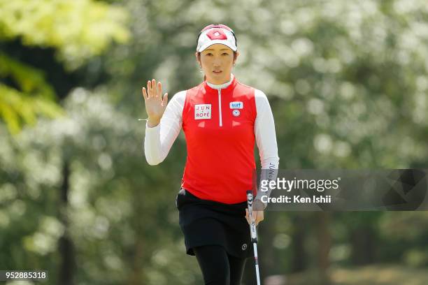 Akane Iijima of Japan reacts after her putt on the 15th green during the final round of the CyberAgent Ladies Golf Tournament at Grand fields Country...