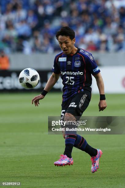 Jungo Fujimoto of Gamba Osaka in action during the J.League J1 match between Gamba Osaka and Sagan Tosu at Suita City Football Stadium on April 29,...
