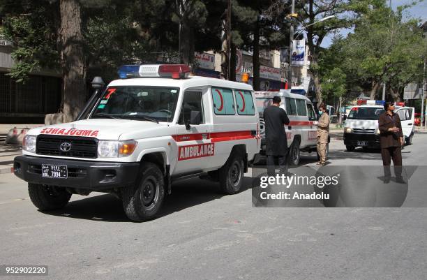 Ambulances arrive at the scene after twin explosions targeted central Kabul, Afghanistan on April 2018. At least 21 people were reported dead and 27...