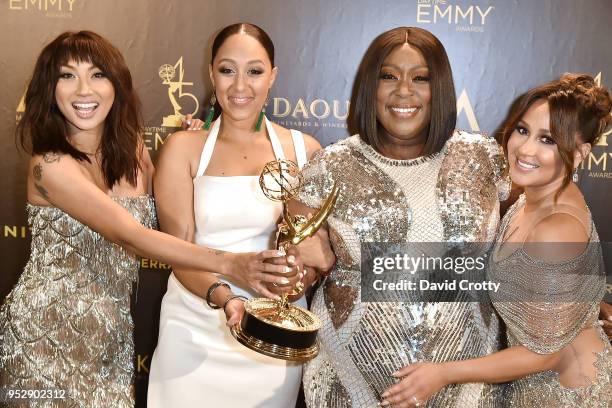 Jeannie Man, Tamera Mowry-Housley, Loni Love and Adrienne Bailon attend the 2018 Daytime Emmy Awards Press Room at Pasadena Civic Auditorium on April...