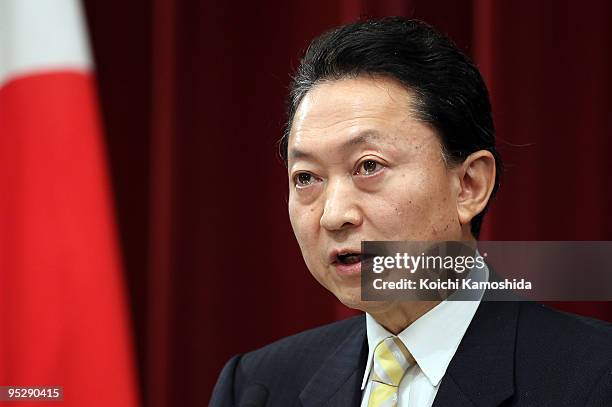 Japan's Prime Minister Yukio Hatoyama attends a press conference on financial year 2010 budget at Hatoyama's official residence on December 25, 2009...