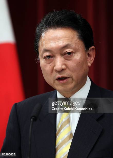 Japan's Prime Minister Yukio Hatoyama attends a press conference on financial year 2010 budget at Hatoyama's official residence on December 25, 2009...