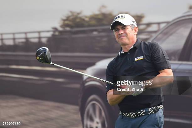 Adilson da Silva of Brazil plays a shot during the final round of the 2018 Volvo China Open at Topwin Golf and Country Club on April 29, 2018 in...