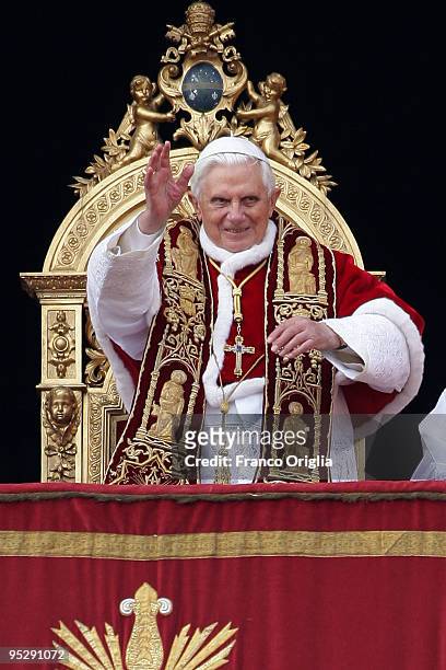 Pope Benedict XVI delivers his 'urbi et orbi' blessing from the central balcony of St Peter's Basilica on December 25, 2009 in Vatican City, Vatican.