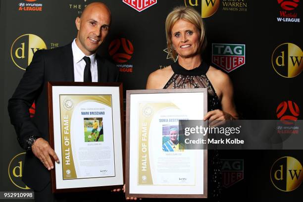 Mark Bresciano and Sonia Gegenhuber pose after being inducted into the Hall of Fame during the FFA Dolan Warren Awards at The Star on April 30, 2018...