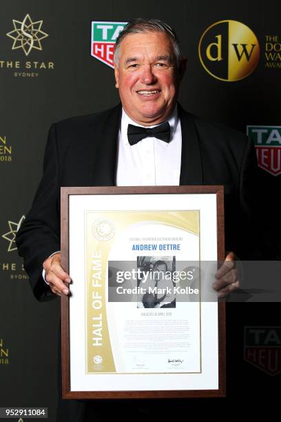 Stephen Dettre poses after receiving the Hall of Fame inductee award for his father Andrew Dettre during the FFA Dolan Warren Awards at The Star on...