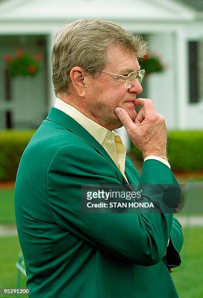 Augusta National Chairman Hootie Johnson watches over the course as players practice 07 April 2003 for the start of the 2003 Masters at Augusta...