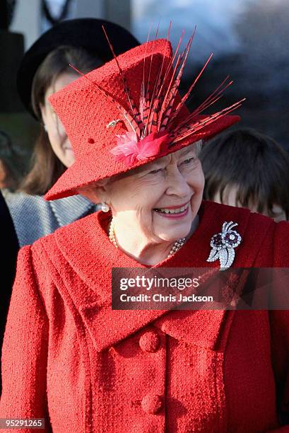 Queen Elizabeth II smiles as she leaves the Christmas Day service at Sandringham Church on December 25, 2009 in King's Lynn, England. The Royal...