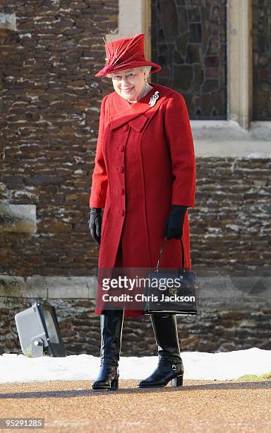 Queen Elizabeth II smiles as she leaves the Christmas Day service at Sandringham Church on December 25, 2009 in King's Lynn, England. The Royal...