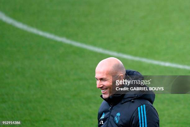 Real Madrid's French coach Zinedine Zidane attends a training session at the Valdebebas training ground in Madrid on April 30, 2018 on the eve of the...