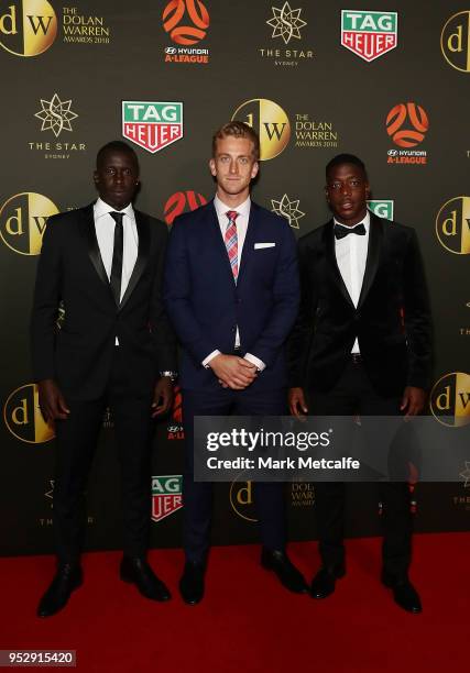 Lawrence Thomas, Leroy George and Thomas Deng arrive ahead of the FFA Dolan Warren Awards at The Star on April 30, 2018 in Sydney, Australia.