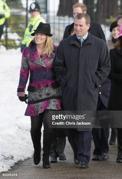 Autumn Phillips and Peter Phillips leave the Christmas Day service at Sandringham Church on December 25, 2009 in King's Lynn, England. The Royal...