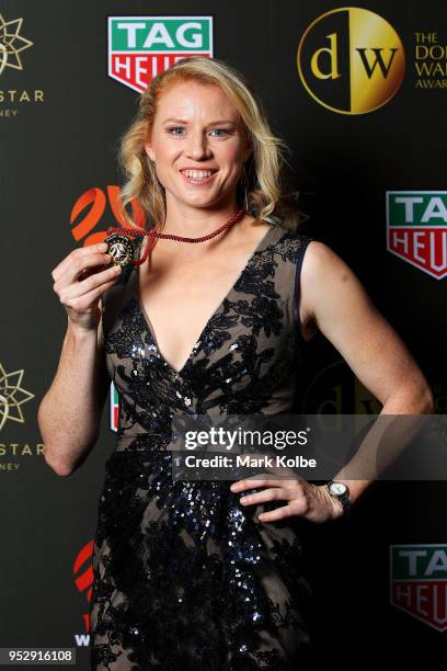 Clare Polkinghorne of the Brisbane Roar poses with the Julie Dolan Medal after being announced the joint winner with Sam Kerr of Perth Glory during...