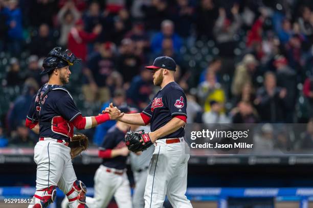 Catcher Yan Gomes of the Cleveland Indians celebrates with closing pitcher Cody Allen after the Indians defeated the Seattle Mariners at Progressive...