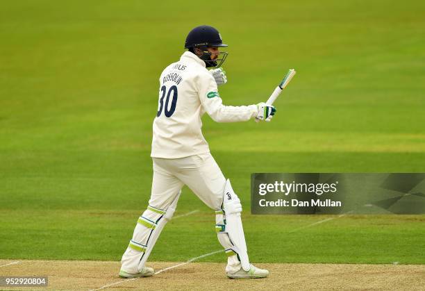 Rilee Rossouw of Hampshire breaks his bat during day four of the Specsavers County Championship Division One match between Hampshire and Essex at...