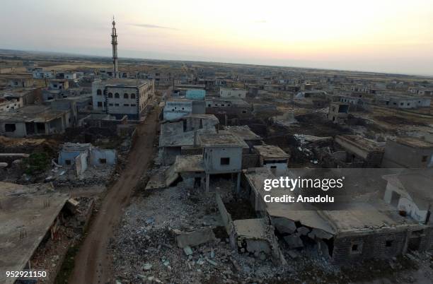 An aerial view of wreckages of structures after the airstrikes over Hola area in northern Homs in Syria on April 30, 2018. Assad regime intensified...