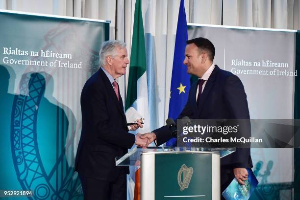S Chief Brexit Negotiator Michel Barnier greets Taoiseach Leo Varadkar ahead of giving a joint speech outlining updates in Brexit talks, at the...