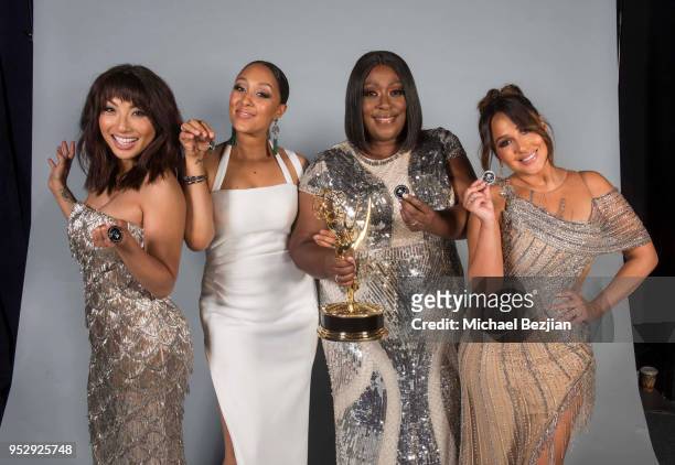 Jeannie Mai, Tamera Mowry, Loni Love, and Adrienne Bailon pose for portrait at 45th Daytime Emmy Awards - Portraits by The Artists Project Sponsored...