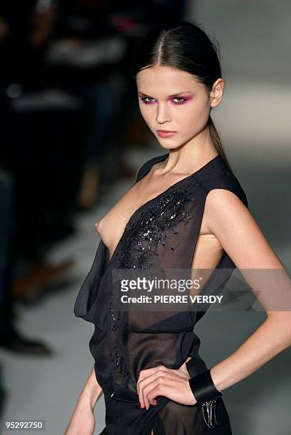 Model presents a creation by Fashion designer Libertin Louison, 23 January 2003 in Paris for his Spring-Summer 2003 collection. Louison is among...