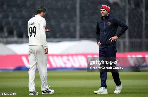 Graham Onions of Lancashire with James Anderson during day four of the Specsavers County Championship Division One match between Lancashire and...