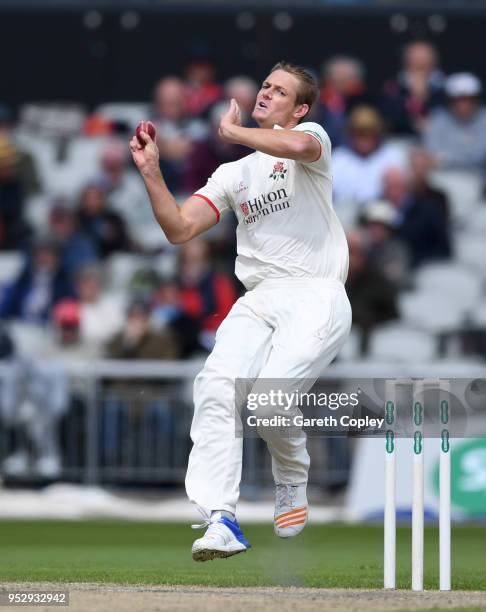 Joe Mennie of Lancashire bowls during day four of the Specsavers County Championship Division One match between Lancashire and Surrey at Old Trafford...