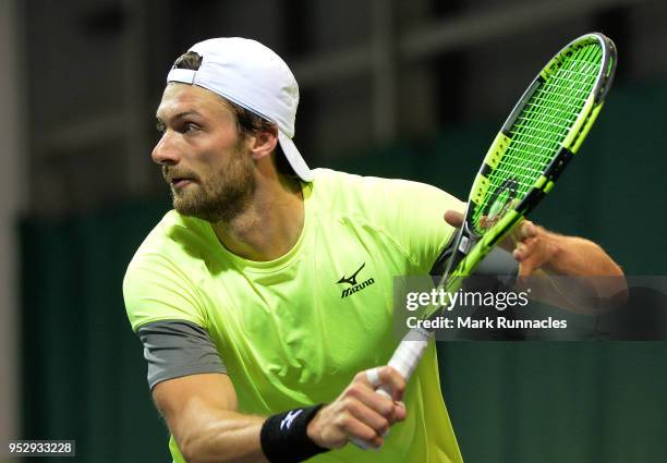 Daniel Brands of Germany in action during his singles match with Jared Hiltzik of USA on the third day of The Glasgow Trophy at Scotstoun Leisure...