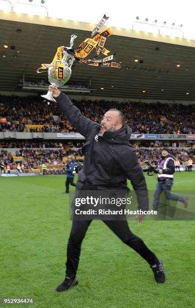 Nuno Espirito Santo, Manager of Wolverhampton Wanderers celebrates with the Sky Bet Championship trophy following the Sky Bet Championship match...