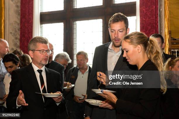 Caroline Wozniacki together with her fiancé David Lee and Lord Mayor Frank Jensen at Copenhagen City Hall, where she is invited as the guest of...