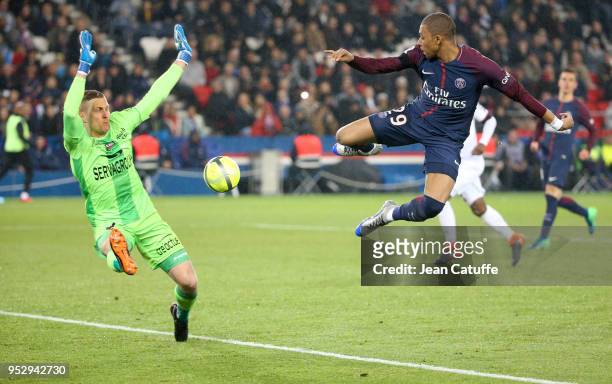 Kylian Mbappe of PSG, goalkeeper of Guingamp Karl-Johan Johnsson during the Ligue 1 match between Paris Saint Germain and En Avant Guingamp at Parc...