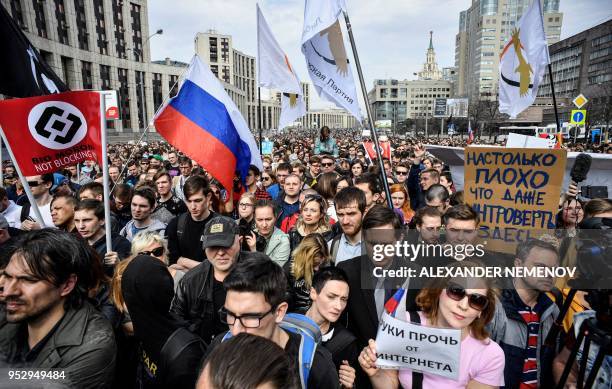 People attend an opposition rally in central Moscow on April 30 to demand internet freedom in Russia. Authorities tried to block access to the...