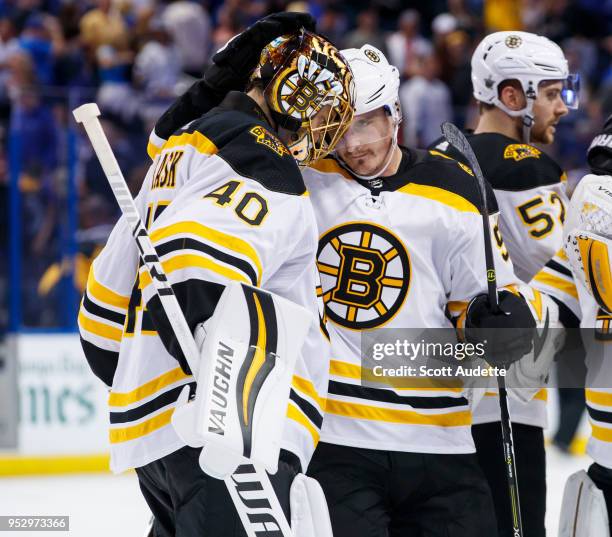 Tuukka Rask of the Boston Bruins celebrate the win against the Tampa Bay Lightning during Game One of the Eastern Conference Second Round during the...