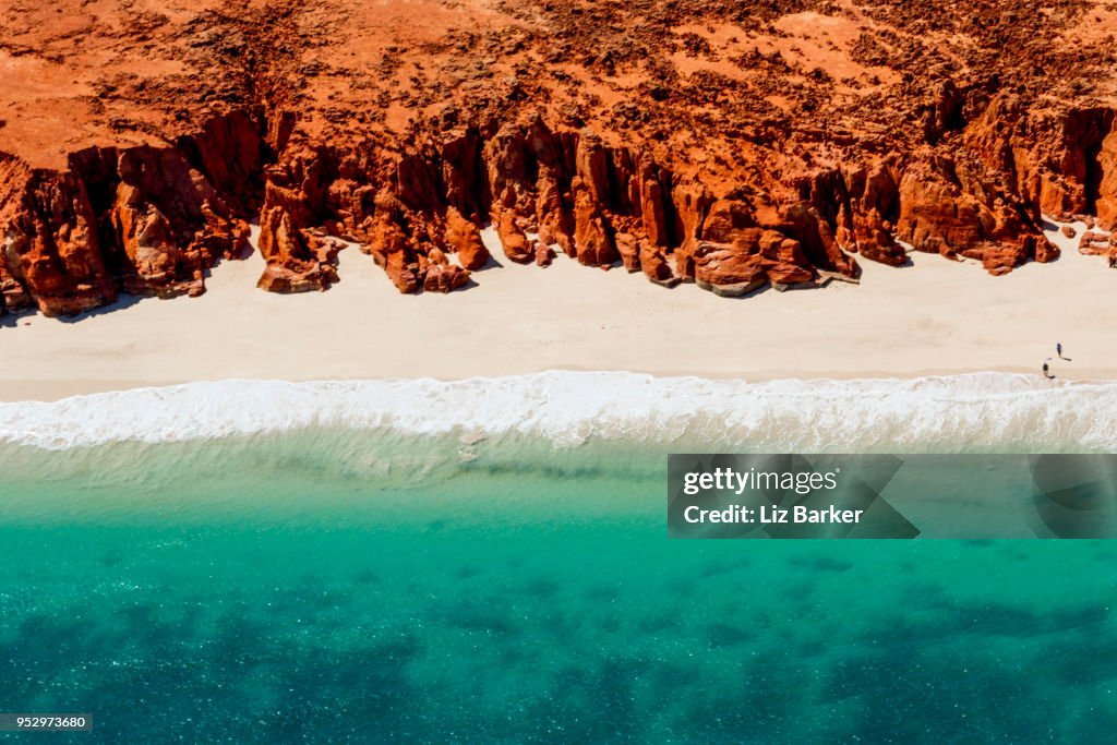 A helicopter view of the white sands, turquoise ocean and striking red Kooljaman Cliffs at Cape Leveque in Western Australia's north west.