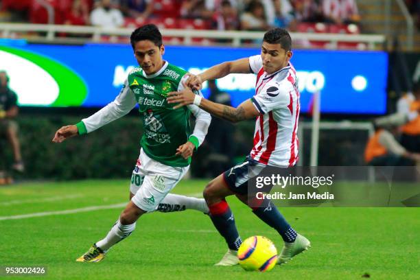 Jorge Diaz of Leon and Orbelin Pineda of Chivas fight for the ball during the 17th round match between Chivas and Leon as part of the Torneo Clausura...