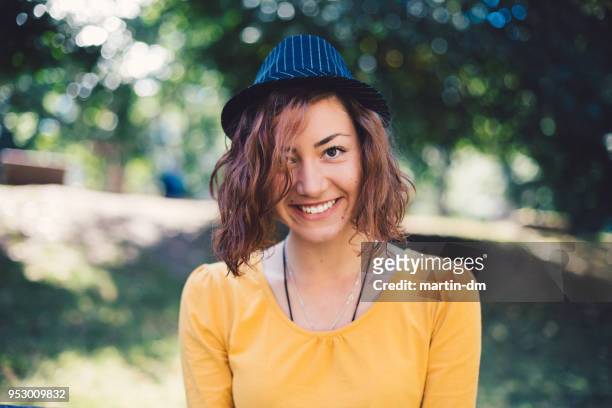 smiling woman's portrait - shy stock pictures, royalty-free photos & images