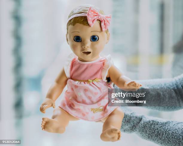 Spin Master Corp. Luvabella brand robotic doll is held up for a photograph at the company's headquarters in Toronto, Ontario, Canada on Tuesday,...