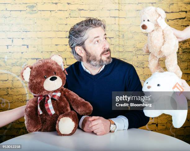 Ronnen Harary, chief executive officer of Spin Master Corp., sits for a photograph with Gund brand teddy bears at the company's headquarters in...