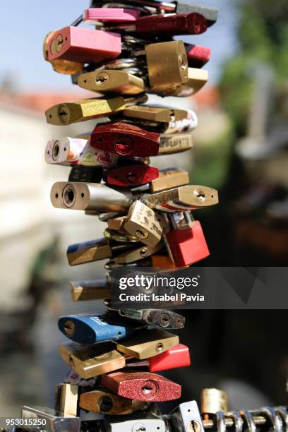 love locks on a fence - isabel pavia stock pictures, royalty-free photos & images