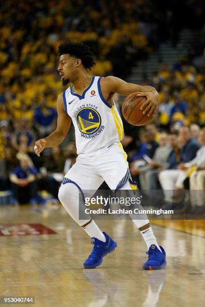 Quinn Cook of the Golden State Warriors dribbles the ball during Game One of the Western Conference Semifinals at ORACLE Arena on April 28, 2018 in...
