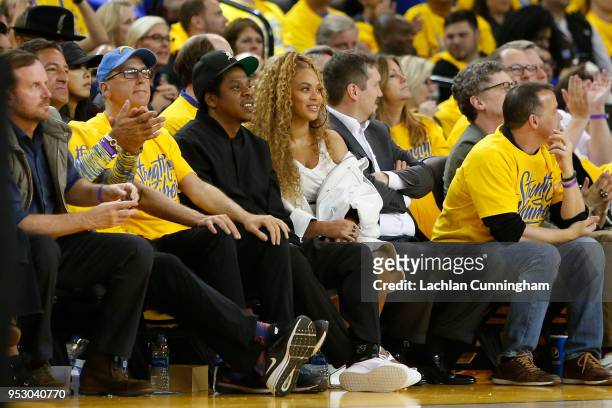 Recording artists Jay-Z ad Beyonce look on during Game One of the Western Conference Semifinals between the New Orleans Pelicans and the Golden State...